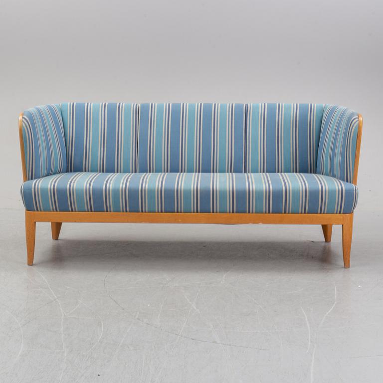 An 'Ulla' oak sofa by Carl Malmsten, 1964.