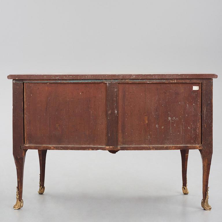 A Louis XV kingwood parquetry and ormolu-mounted commode in the manner of Jacques-Philippe Carel (Paris, 1723-1760).