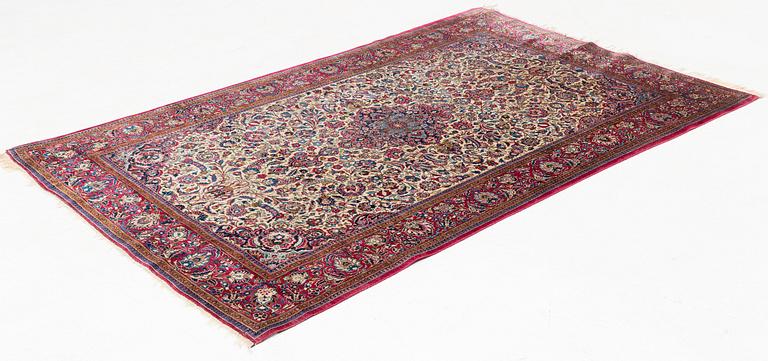 An antique silk Kashan rug, ca ca 200 x 124 cm.