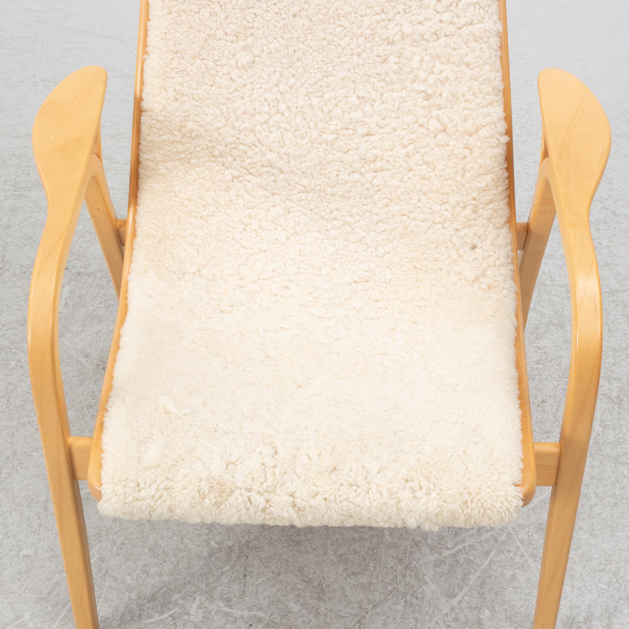 Yngve Ekström, armchair with footstool, "Lamino", Swedese.
