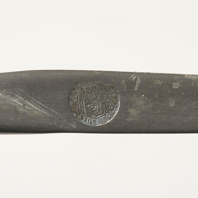 Firma Svenskt Tenn, a pewter hand mirror model A 1497 and a letter opener in the shape of an alligator, Stockholm, 1930s-40s.