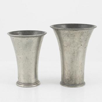 Firma Svenskt Tenn, four pewter beakers, Stockholm 1927, 1928 and 1929.