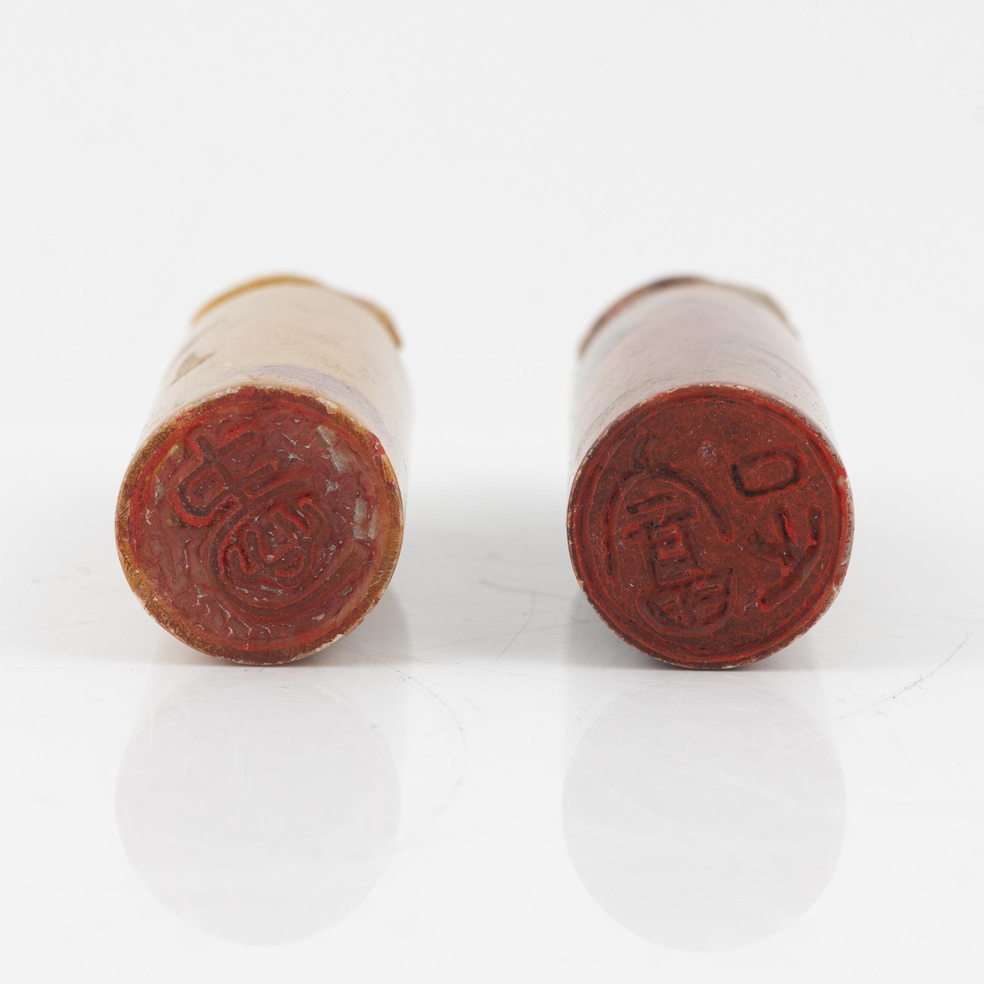 A set of four stone scholars objects and a enameled silver box with cover, Qing dynasty, circa 1900.