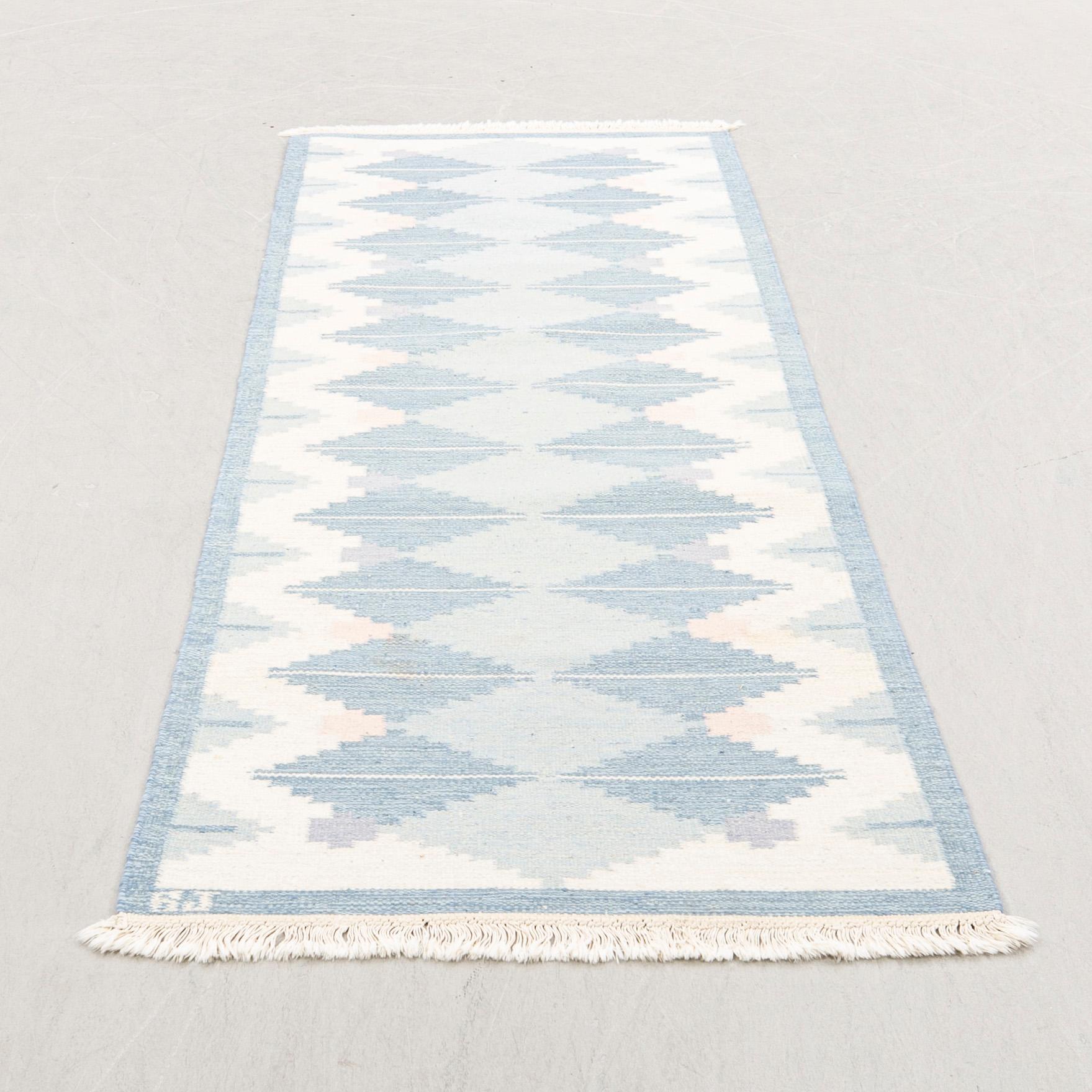 Rölakan rug, gallery signed BJ, approximately 255x87 cm.