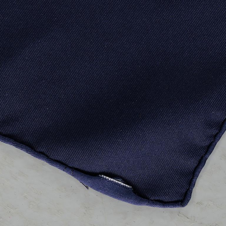 HERMÈS, "Tibet" scarf, and brooch.