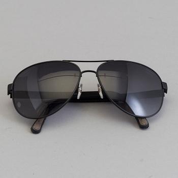 Chanel black pilot summer glasses.