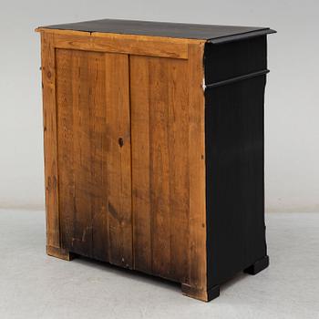 A painted renaissance style chest of drawers from around 1900.