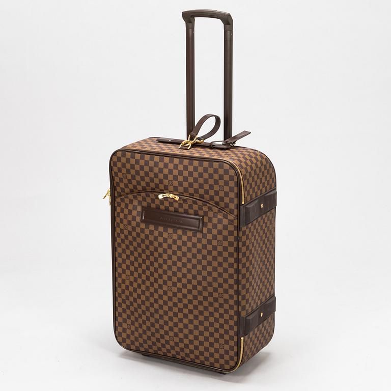 Louis Vuitton, A Damier Ebene 'Pegase 70' luggage.