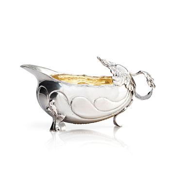 250. A Swedish parcel-gilt silver cream-jug, mark of Daniel Lundström, Stockholm 1764.