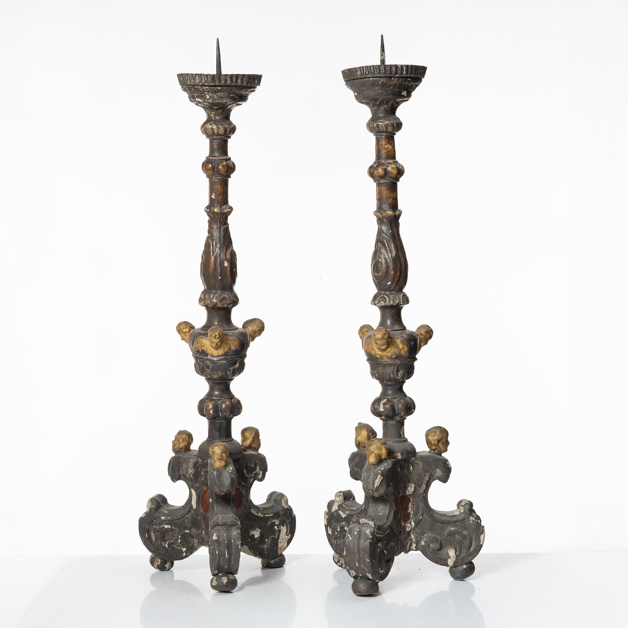 A pair of Baroque style candleholders, 19th Century.