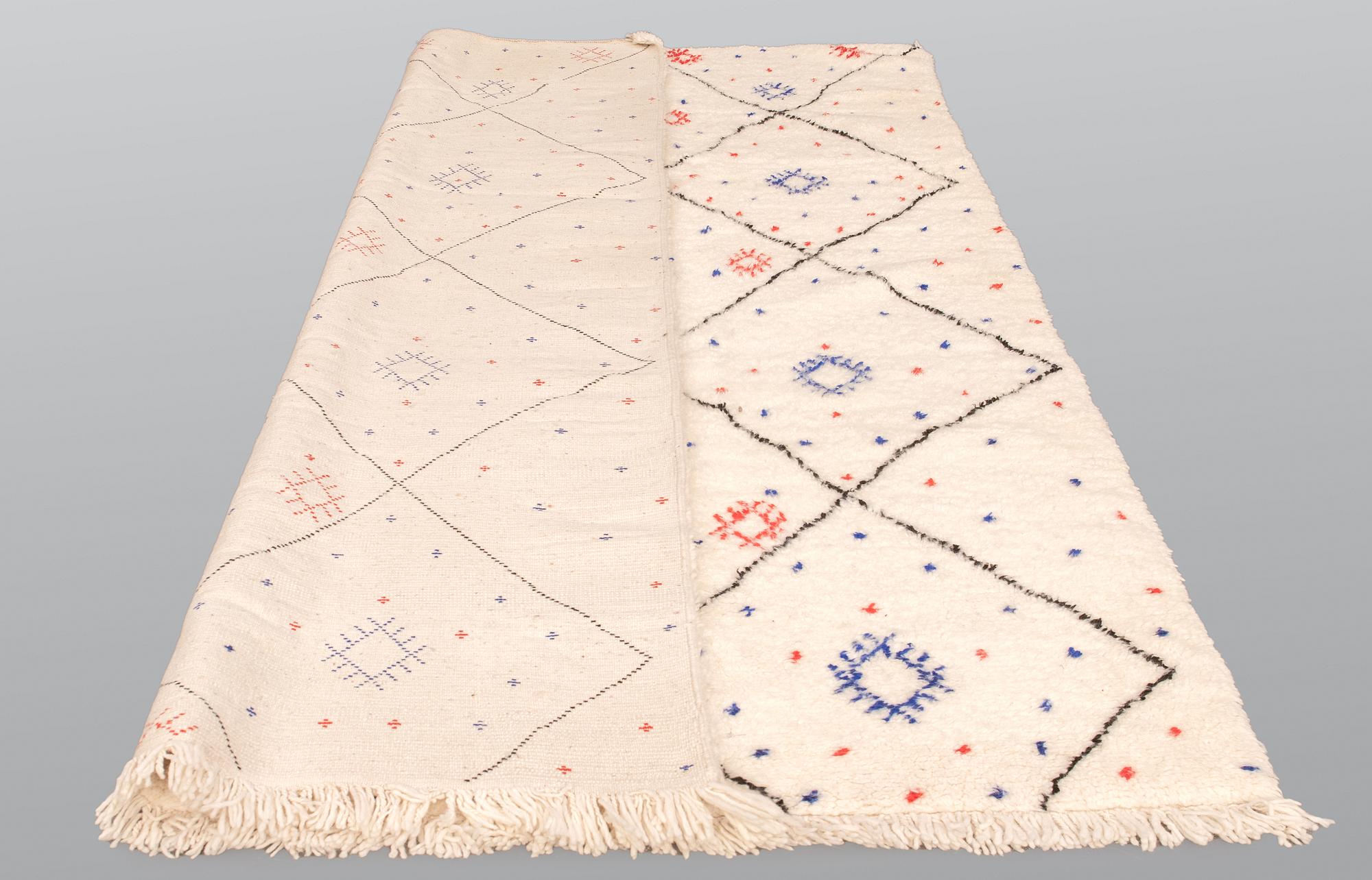 A Moroccan carpet, 288 x 175 cm.