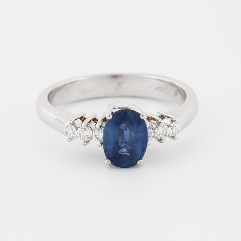 A sapphire and brilliant cut diamond ring.