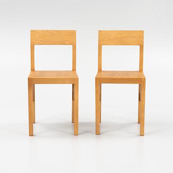 A pair of signed stained pine 'Bracket Chairs' by Frederik Gustav for Frama, Copenhagen 2023.