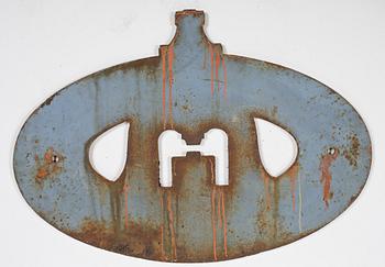 SKYLT, gjutjärn, 1900-talets första hälft.