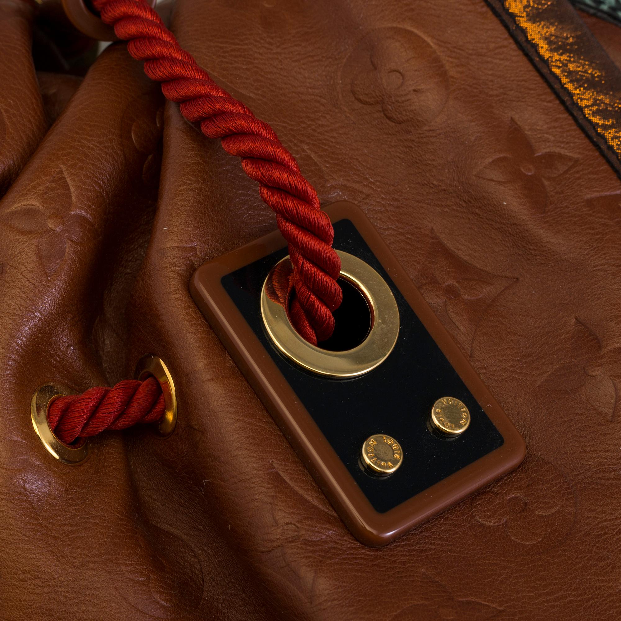 Louis Vuitton Limited Edition Monogram Epices Kalahari GM Bag.