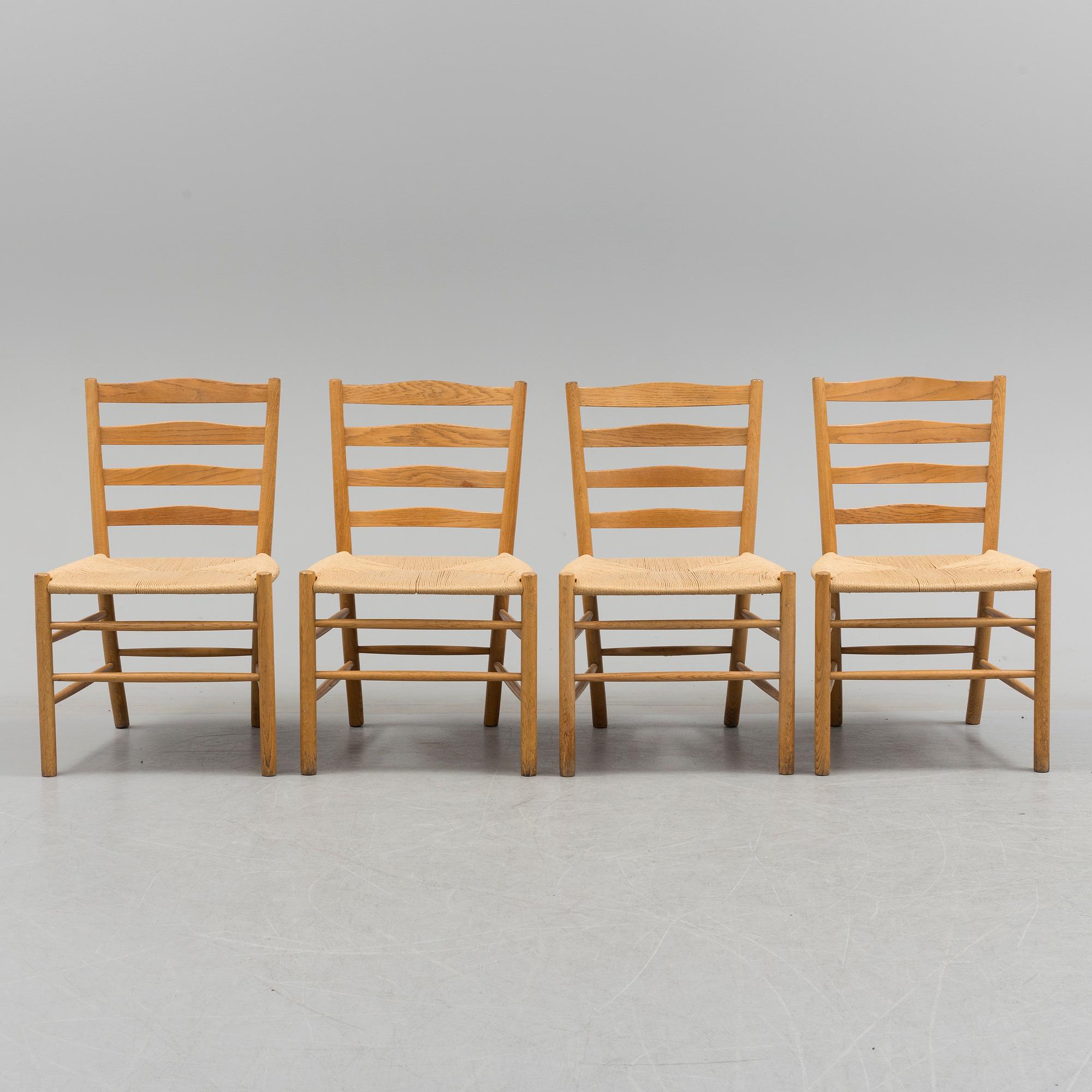 KAARE KLINT, four oak 'Kirkestolen' from Fritz Hansen, Denmark.