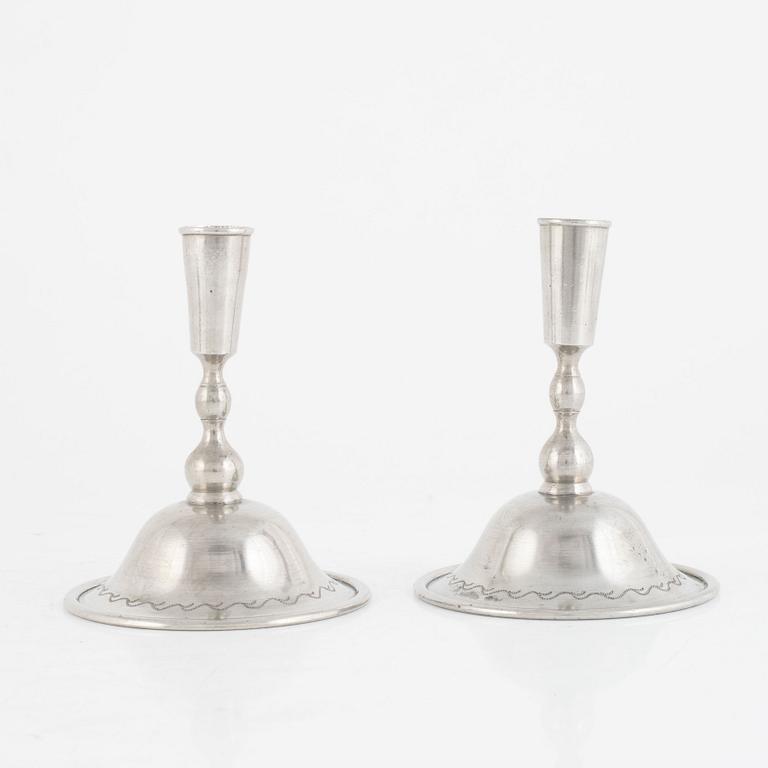 Firma Svenskt Tenn, a pair of pewter candlesticks model "76", Stockholm 1925.