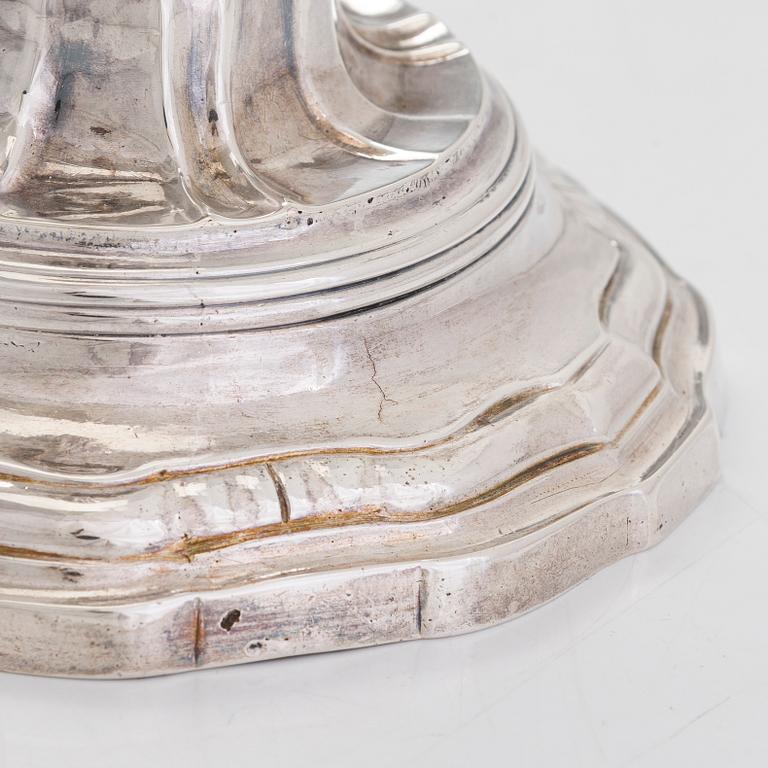 A pair of 18th-Centuty French silver candlesticks, maker's mark of Jean-Joseph Falguière (active in Dinan 1744-1773).
