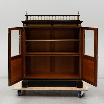 a late 19th Century show cabinet.