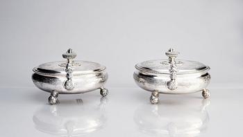 A pair of Swedish parcel-gilt silver bowls with covers, mark of S.A.Ackland, 1953 and 1963.