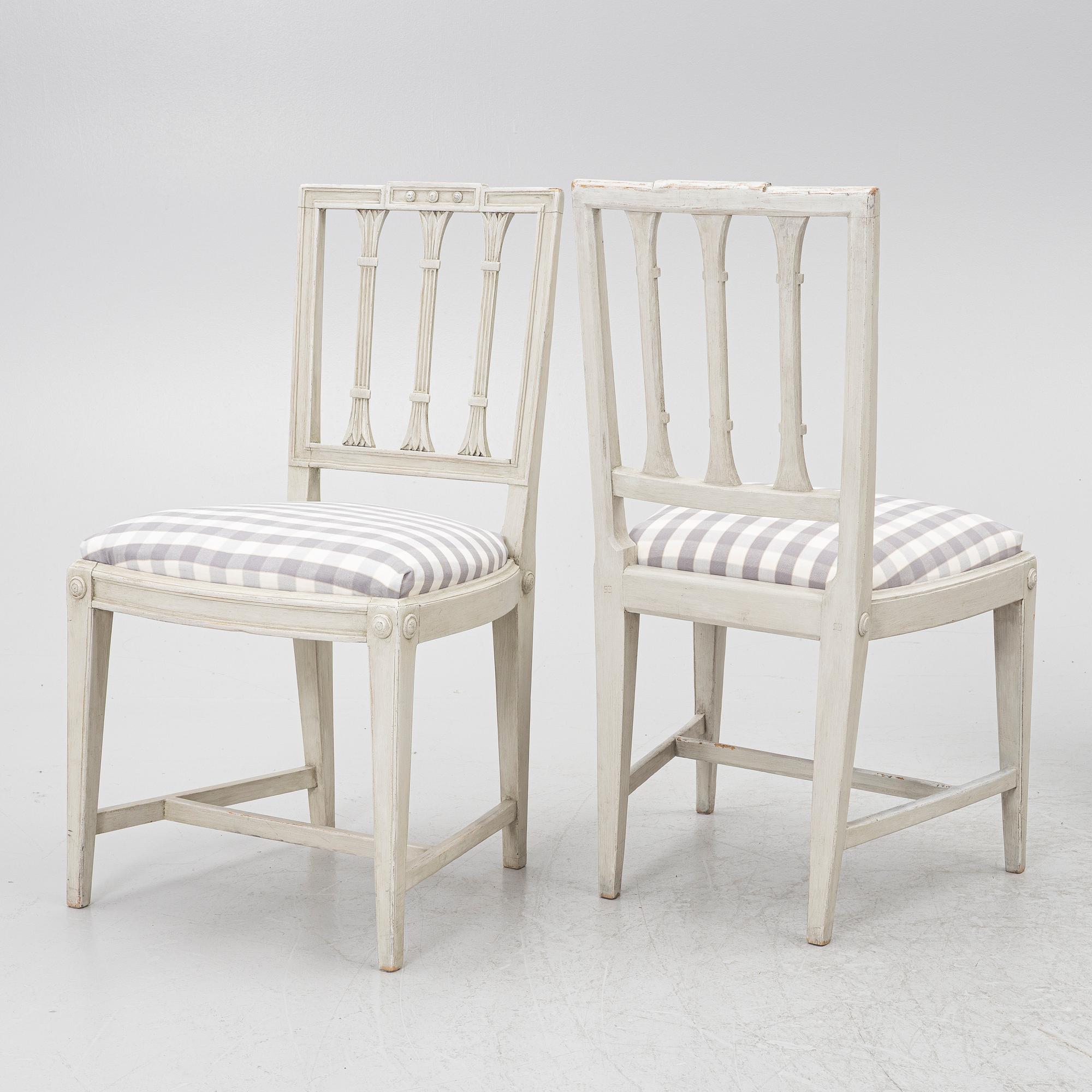 Three late Gustavian chairs, circa 1800. And one chair, late Gustavian style, 20th century.