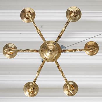 A six-light 18/19th century brass chandelier.