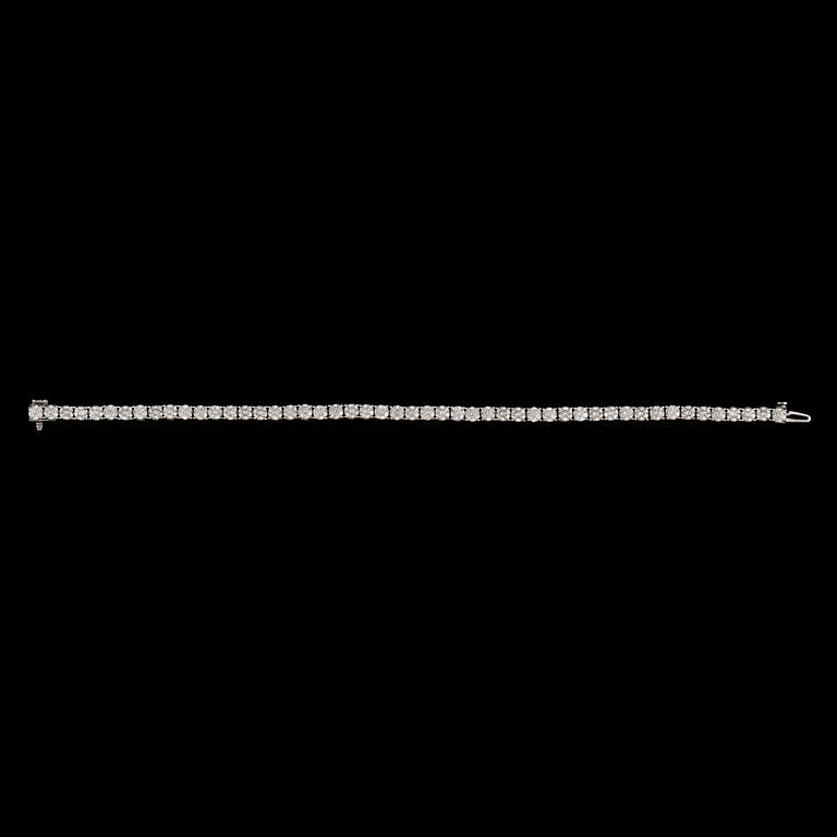 A brilliant-cut diamond, circa 8.20 ct, line bracelet.