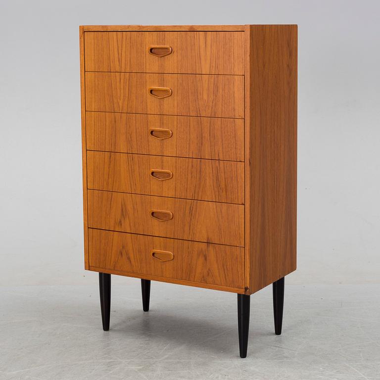 A mid 20th century teak chest of drawers.