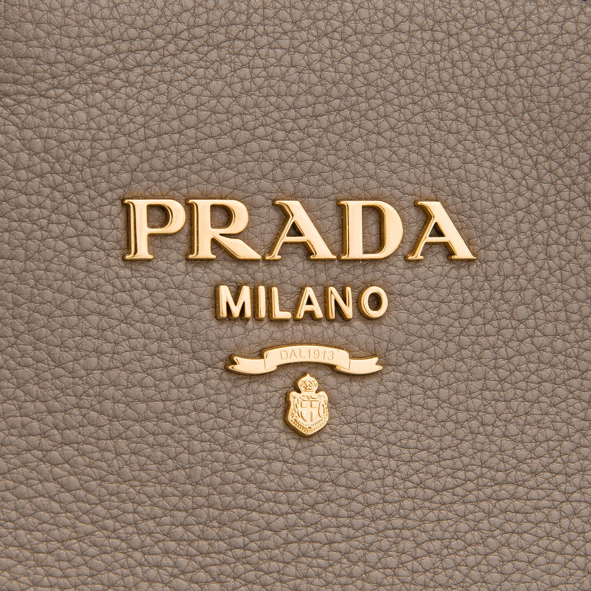 Prada, a clay gray leather handbag, 2020.