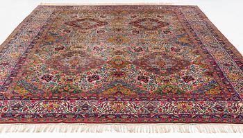 A semi-antique Kerman carpet, ca  402 x 291 cm.
