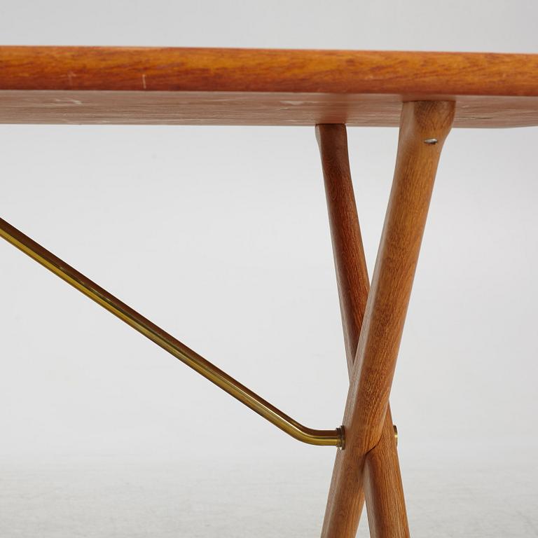 Hans J. Wegner, a 'Savbukkebordet AT 303' dining table, Andreas Tuck, Denmark.
