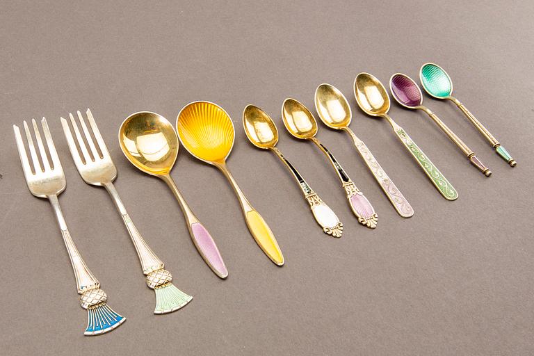 A 20th century set of 45 pcs of different silver and enamel cutlery total weight approx 432 gr.