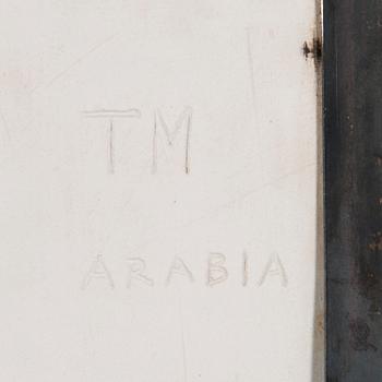 TOINI MUONA, A stoneware relief signed TM Arabia.