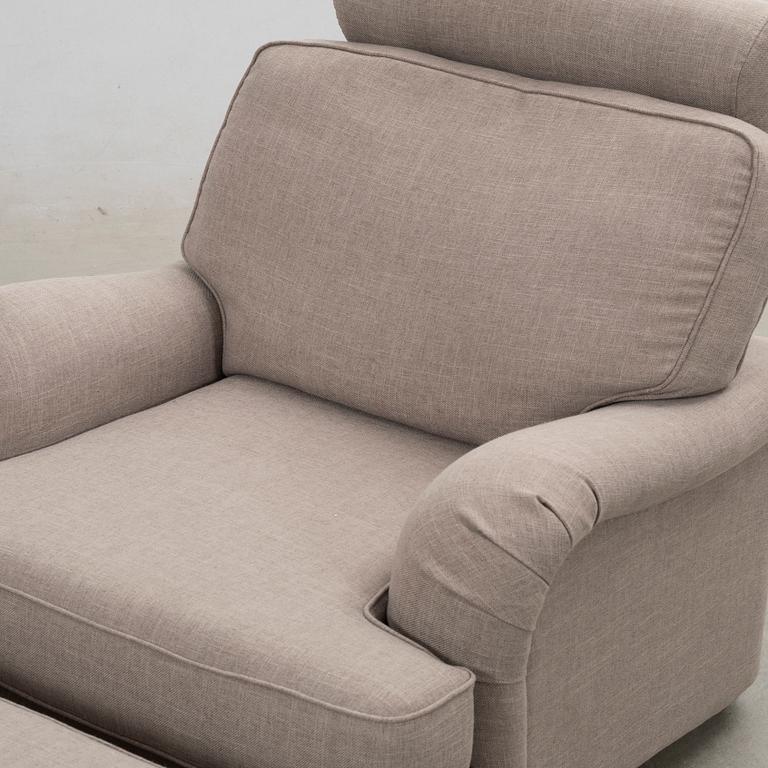 Armchair with footstool, Howard model.