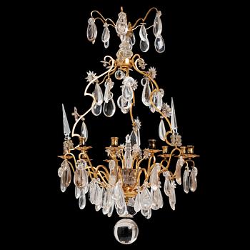 101. A Louis XV-style rock crystal eight-light chandelier, 20th century.