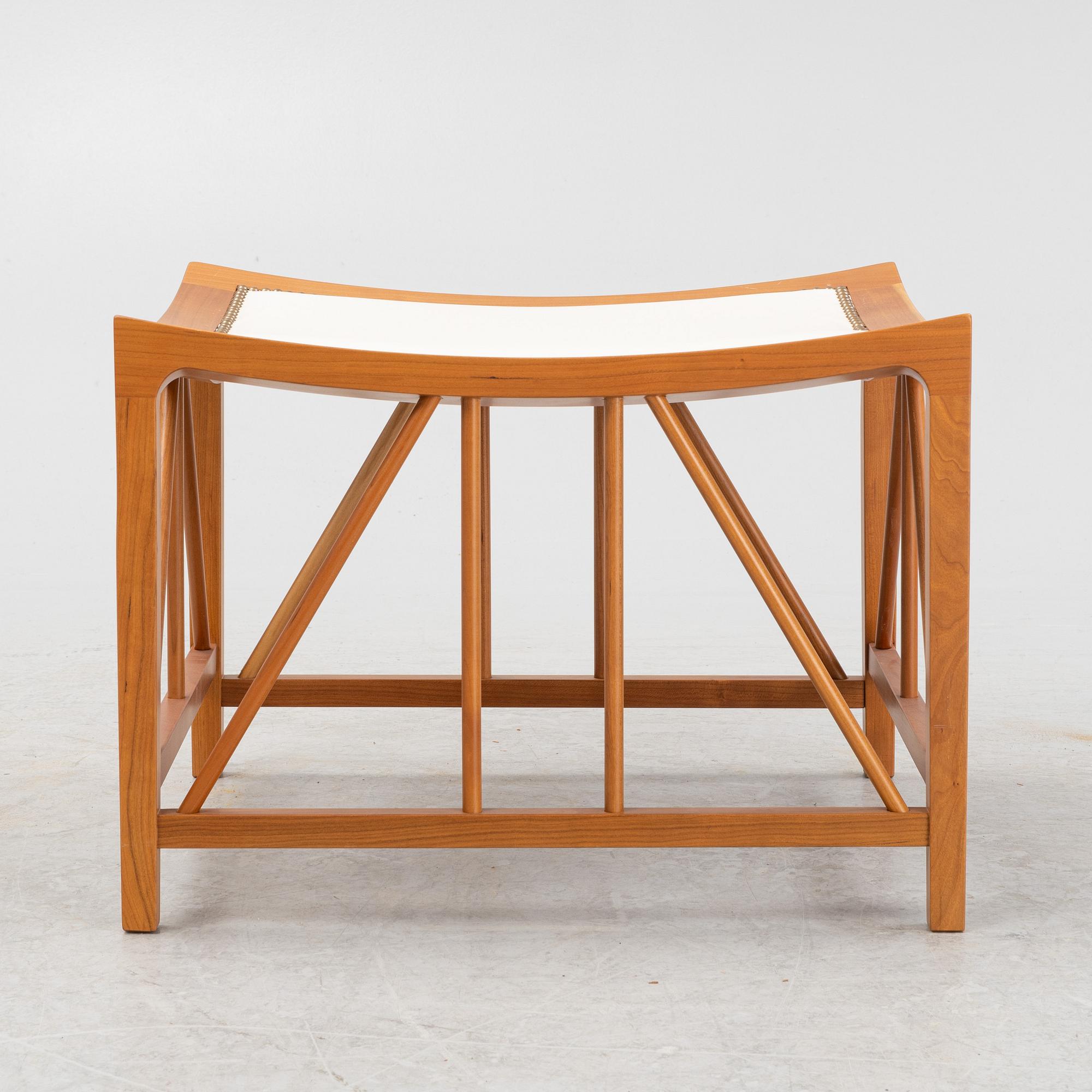 Josef Frank, a model 1063 cherry wood stool, Firma Svenskt Tenn, 21st Century.