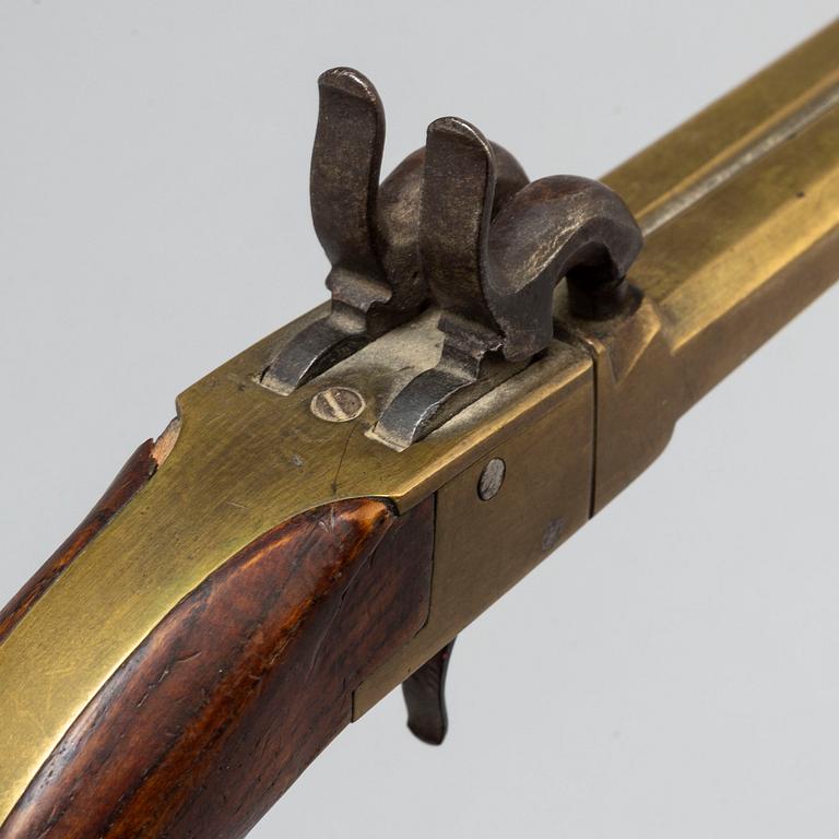 One revolver and one percussion gun, second half of the 19th century.