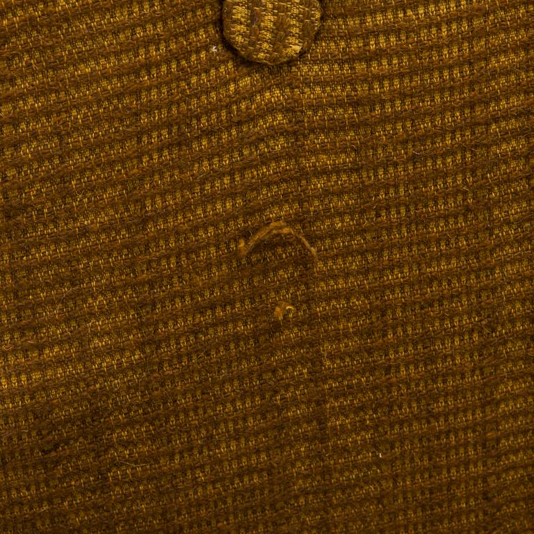 A pair of 1970s armchairs.