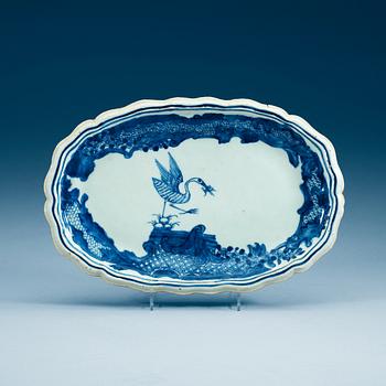 1768. A blue and white armorial serving dish, Qing dynasty, Qianlong (1736-95).