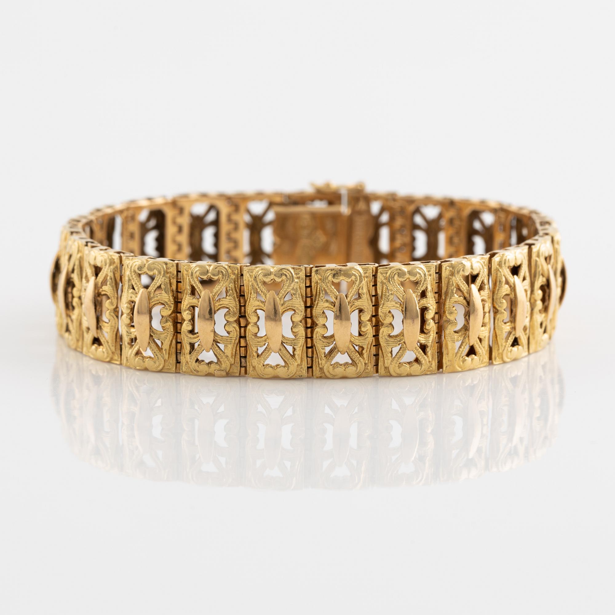 18K gold, Italian mark, Verona.