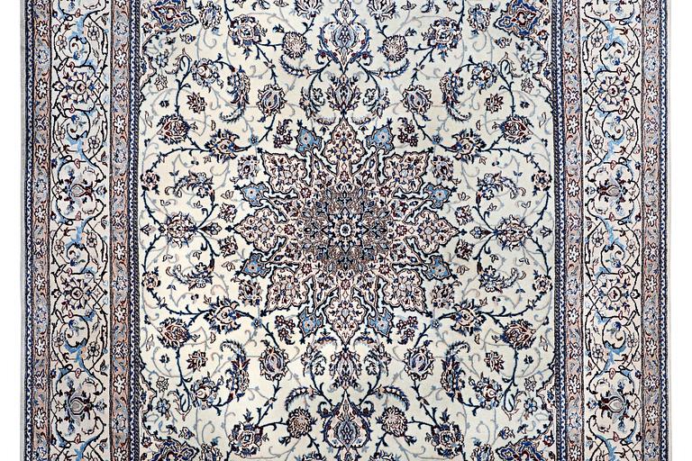 A carpet, Nain, part silk, 6 laa, c. 265 x 173 cm.