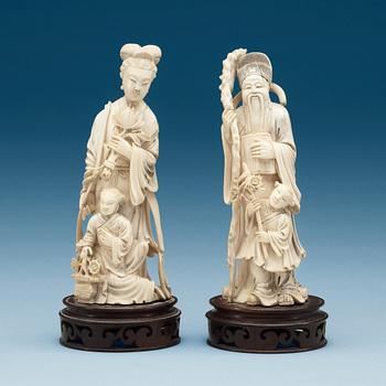 A pair of Chinese ivory figures, early 20th Century.