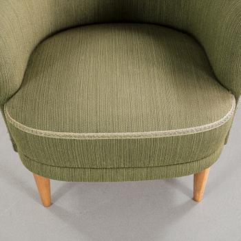 A "Samsas" armchair by Carl Malmsten.