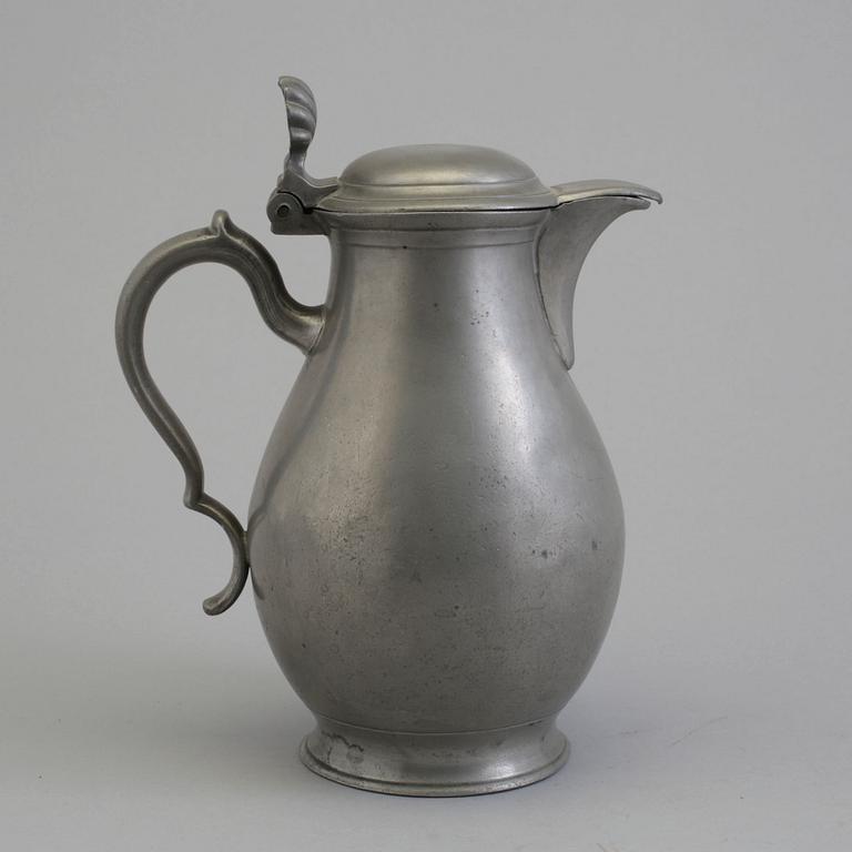 A 18th century tin pot.