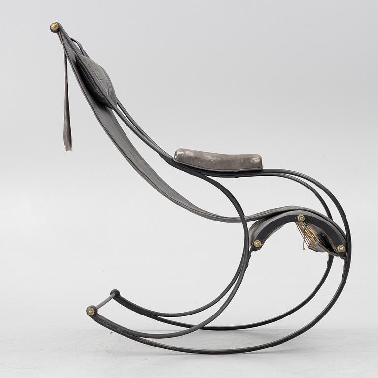An iron rocking chair, R.W Winfeild & Company, England, late 19th century.