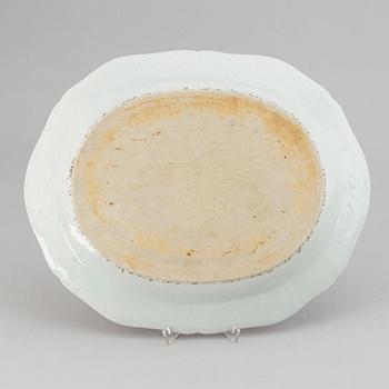 Two famille rose serving dishes and a sauce boat, Qing dynasty, Qianlong (1736-95).