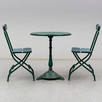 A garden table with four chairs from Byarum Bruk.