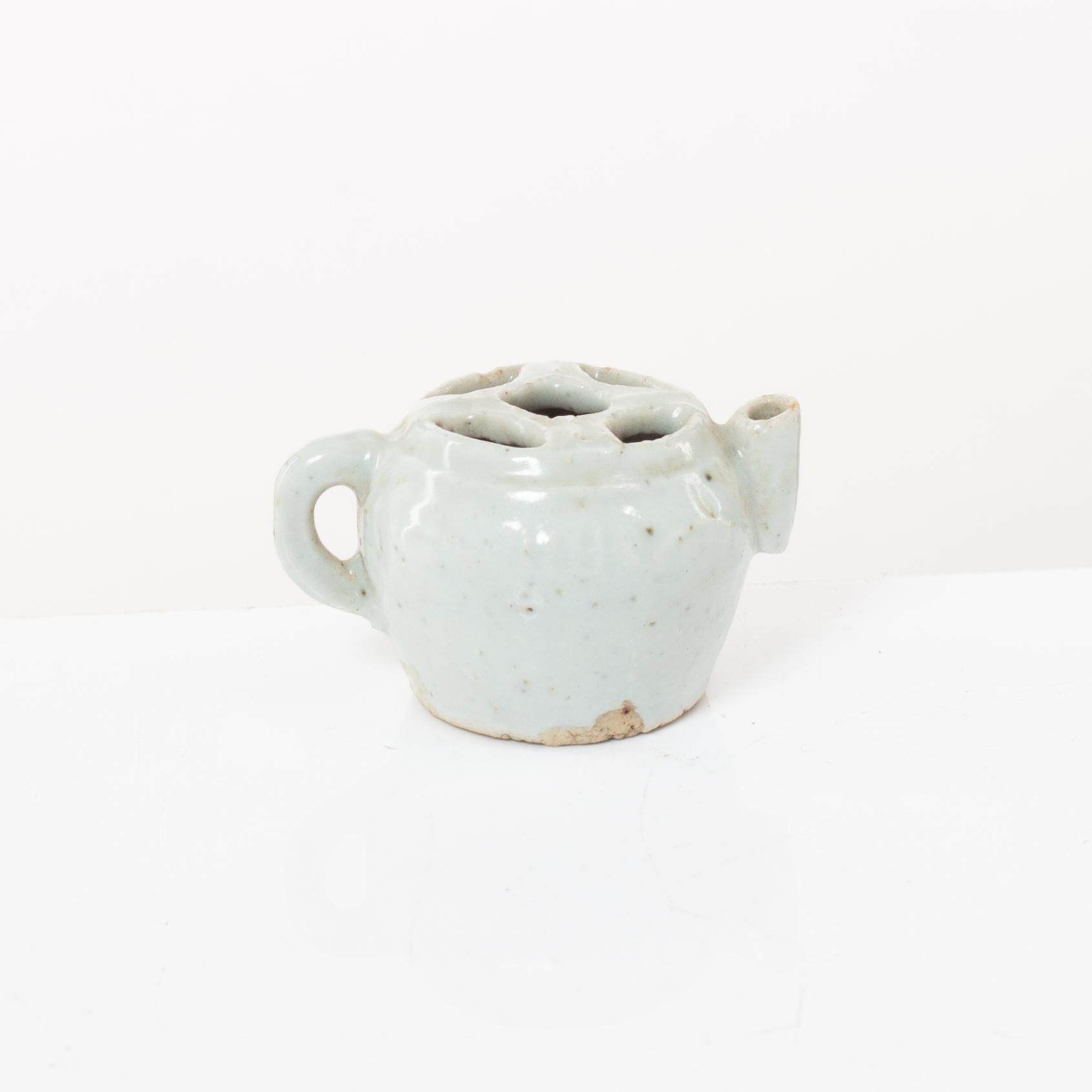 Two joss stick holders, a vase, a brush washer and a small ewer, Qing dynasty, 19th century and older.