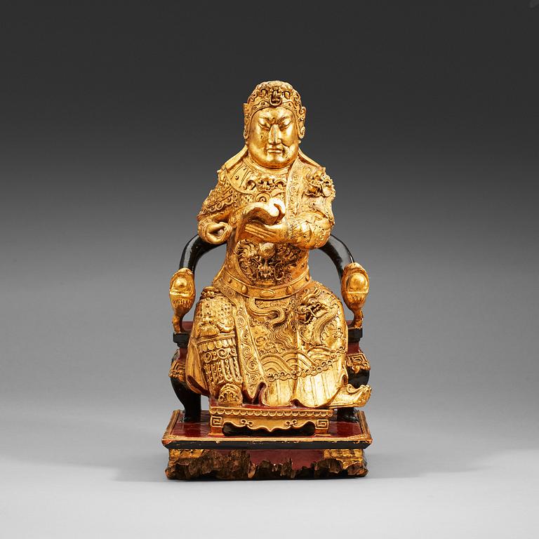 A large seated sculpture of Guandi, Qing dynasty, 17/18th Century.