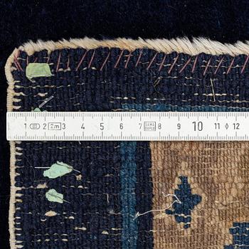 An antique Beijing carpet, northern China, approx. 287 x 239 cm.